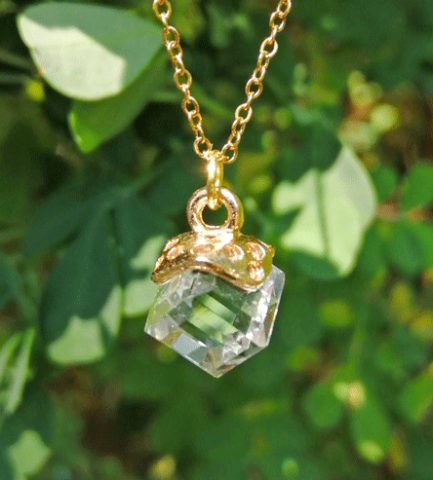 Pendant with transparent crystal cube