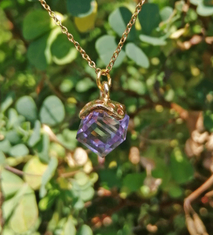 Pendant with clear purple crystal cube