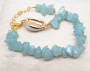 Bracelet with natural aquamarine stones and cowrie porcelain