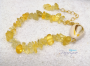 Bracelet with natural citrine stones and cowrie porcelain