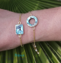 Golden bracelet with pierced circle-shaped abalone mother-of-pearl