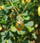 Pendant with a yellow crystal cube