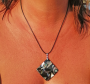 Diamond-shaped pendant in black and abalone mother-of-pearl
