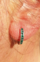 Boucles d'oreilles rondes avec pierres vert éméraude en zircon cubique