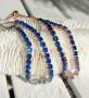 Bracelet avec pierres bleu saphir clair sur support or rose