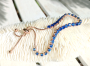 Bracelet avec pierres bleu saphir clair sur support or rose