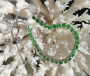 Bracelet avec pierres vert émeraude sur support argent