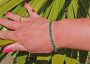 Bracelet en pierres vert émeraude rondes en zircon