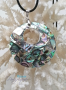 Pendentif en nacre d'abalone en forme de cercle percé